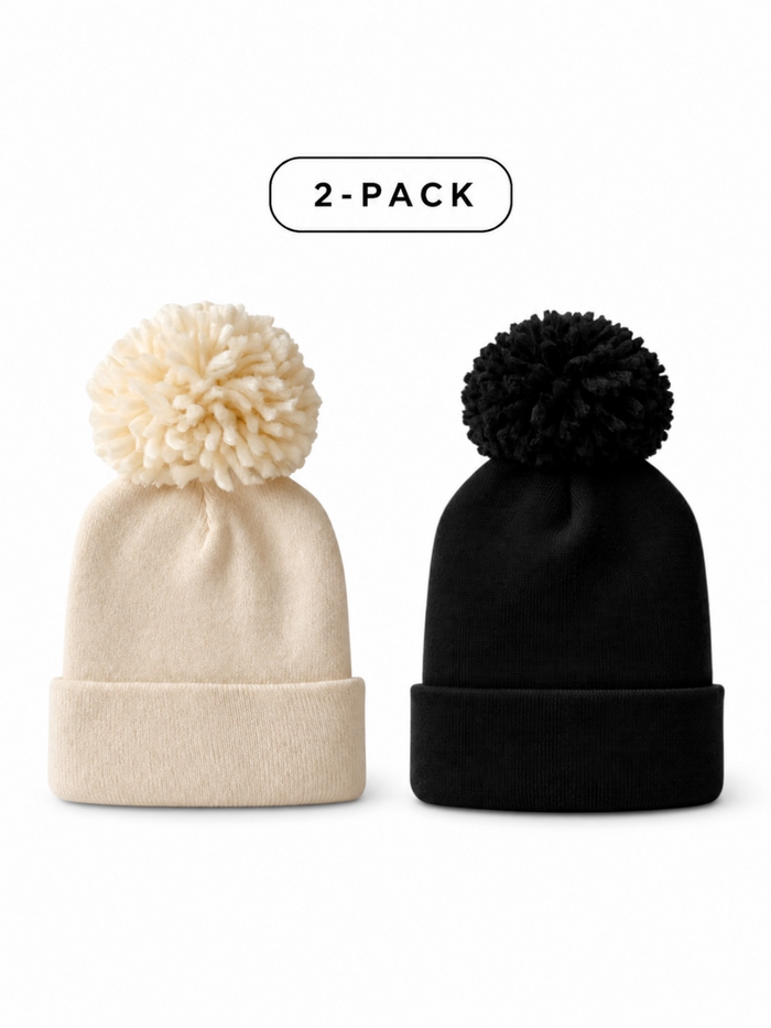 Two beanies in a pack: one cream and one black, both with pom-poms on top.