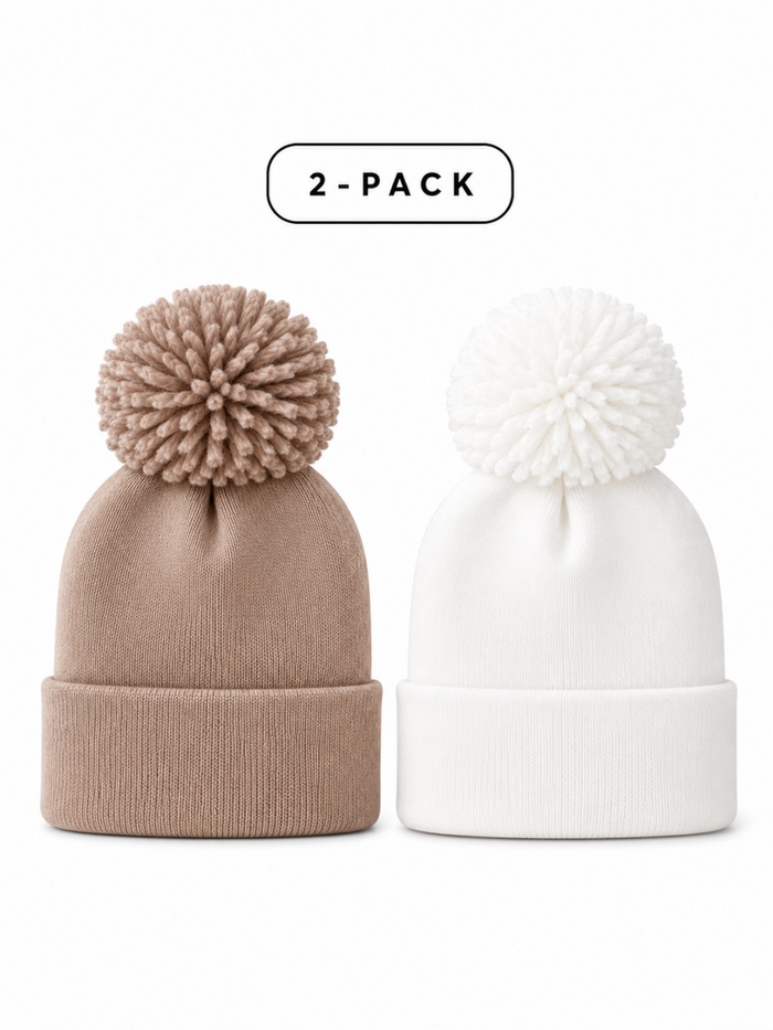 Two winter beanies in beige and white with pom-poms, packaged as a 2-pack for stylish warmth.