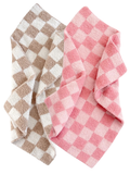 Two soft, checkered blankets in pink and beige tones, folded together.