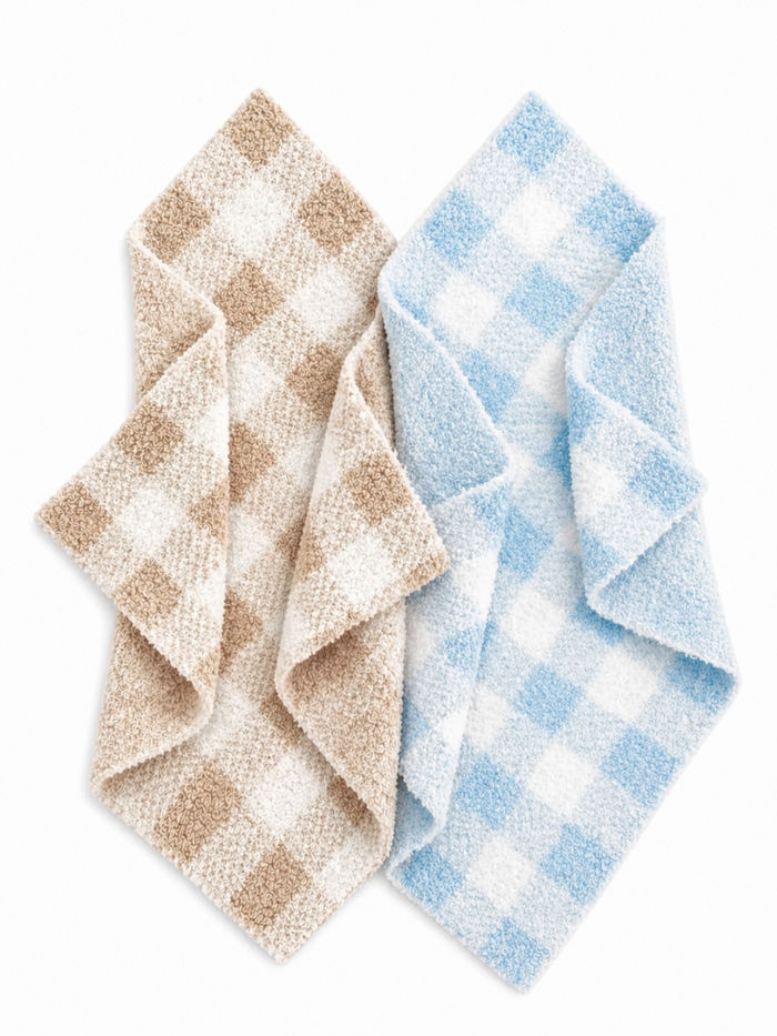 Two checkered kitchen towels in brown and blue colors, neatly folded and displayed on a white background.
