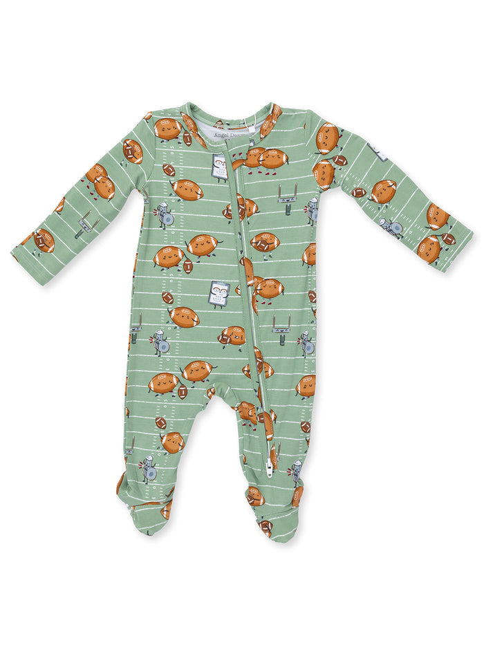 Green infant onesie with playful football and cartoon character prints. Features zipper for easy dressing.