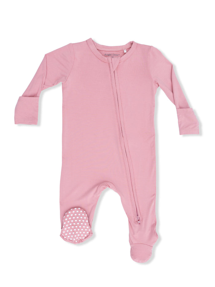 Pink long-sleeve onesie with a front zipper and polka dot accents on the feet. Ideal for infants and toddlers.
