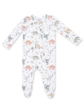 White baby onesie with colorful dinosaur and plant patterns, featuring long sleeves and a front zipper.