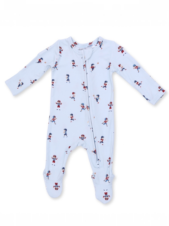 Light blue baby onesie with playful sports-themed prints and a front zipper. Perfect for active toddlers.