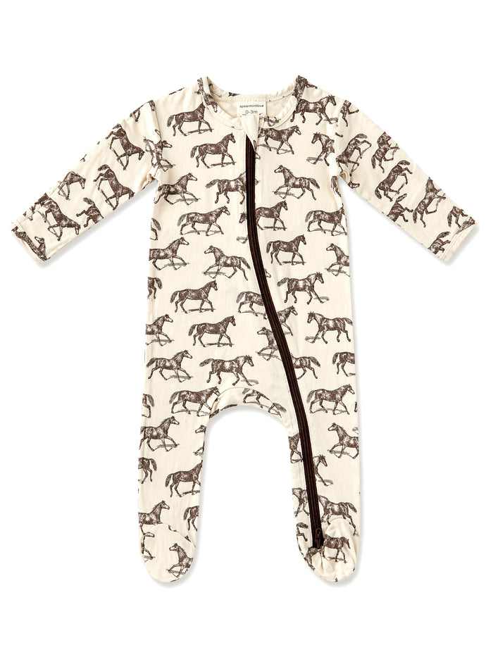 Cream-colored baby romper with a horse print and a front zipper, designed for comfort and style.