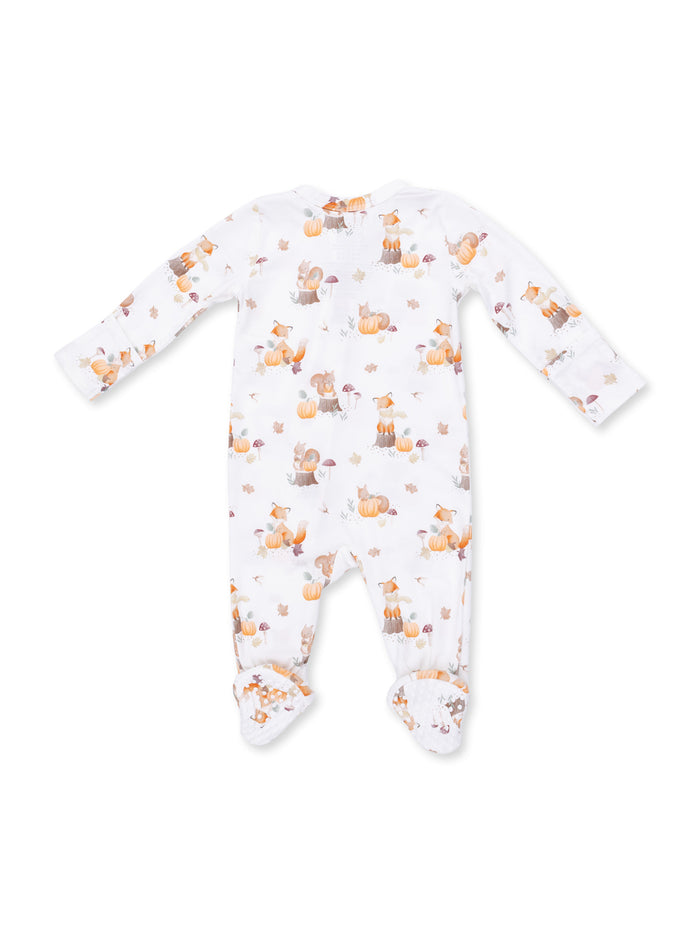 White baby onesie with cute animal and pumpkin patterns on the back, featuring long sleeves and footed design.