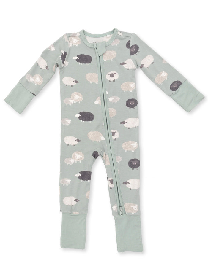 Light green zip-up onesie with sheep print in various colors, featuring long sleeves and footed legs.