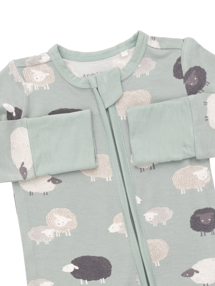 Light green baby onesie adorned with cartoon sheep patterns, featuring a front zipper and fold-over cuffs.