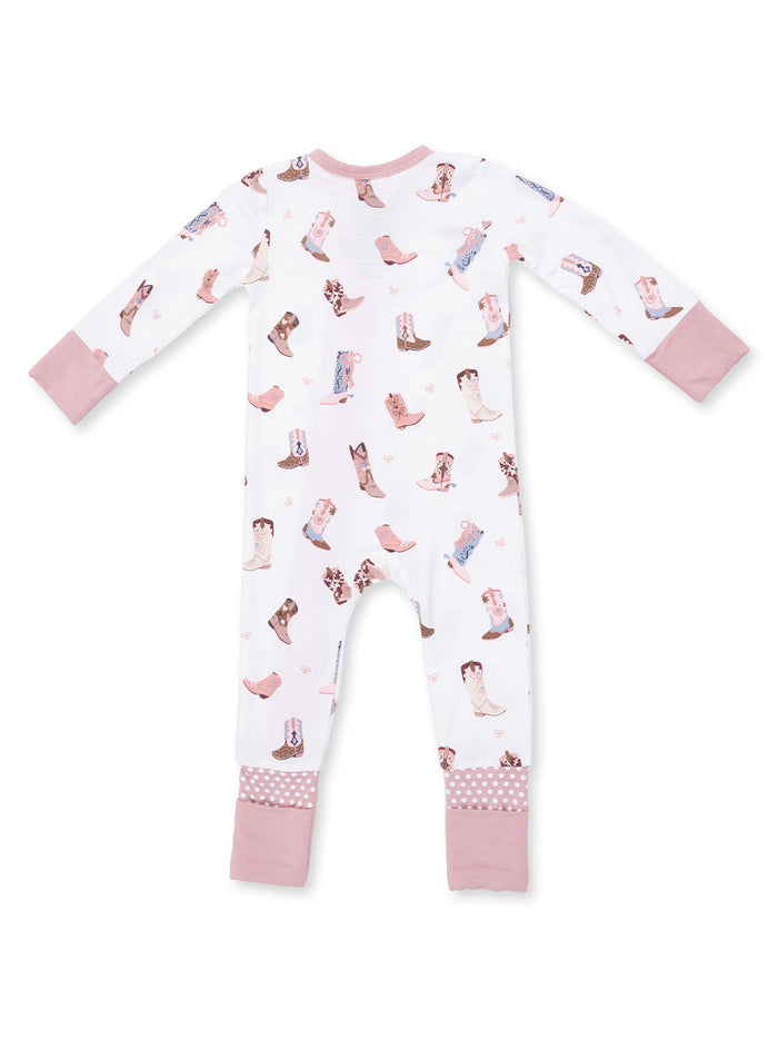 White pajama suit with colorful boot prints and pink cuffs, perfect for kids' cozy sleepwear.