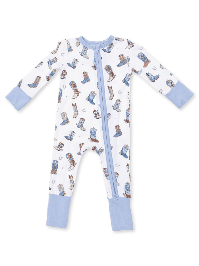 White baby onesie with blue accents and playful boot prints. Features a front zipper for easy dressing.