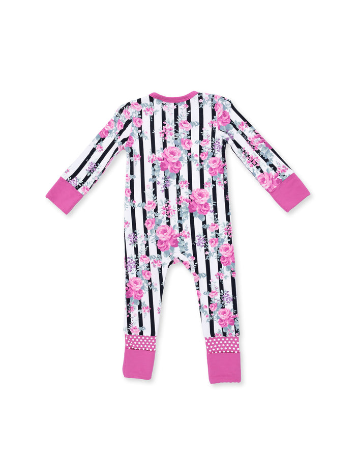 Floral striped pajamas with pink accents, featuring long sleeves and polka-dot cuffs.