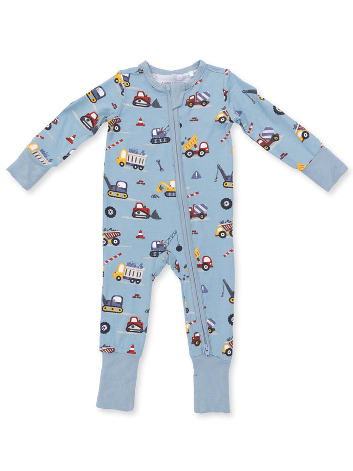 Children's blue zip-up coverall with colorful construction vehicle prints. Ideal for play and comfort.