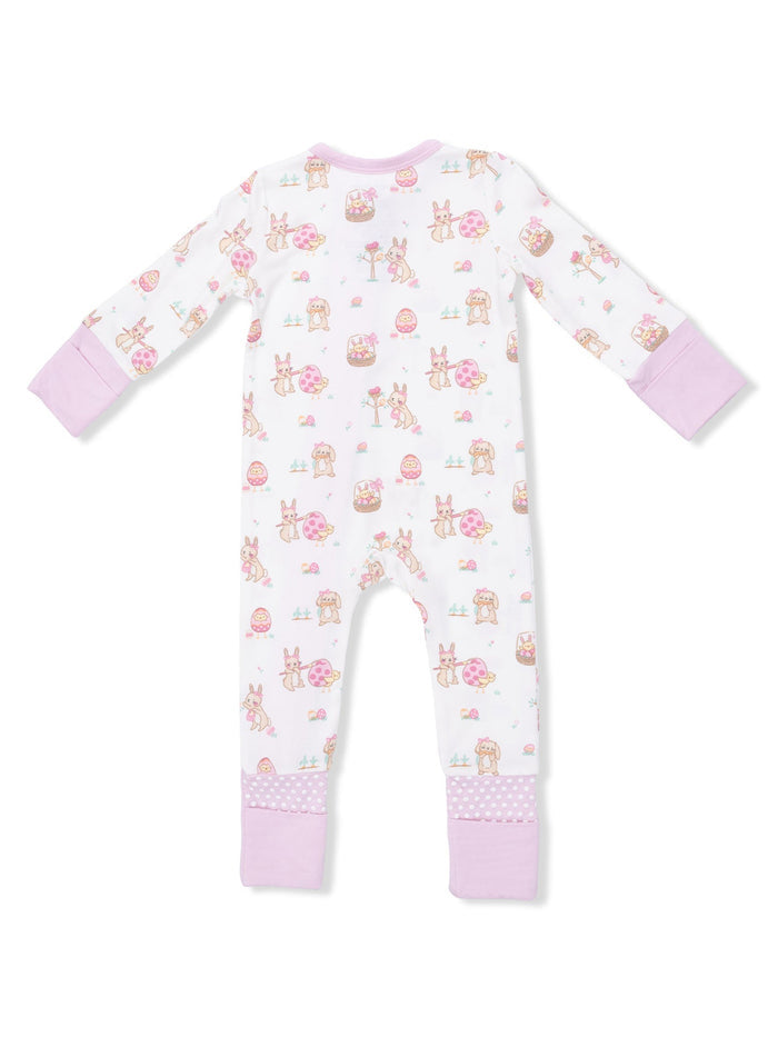 Back view of a children's onesie with playful bunny and egg patterns in pastel colors.