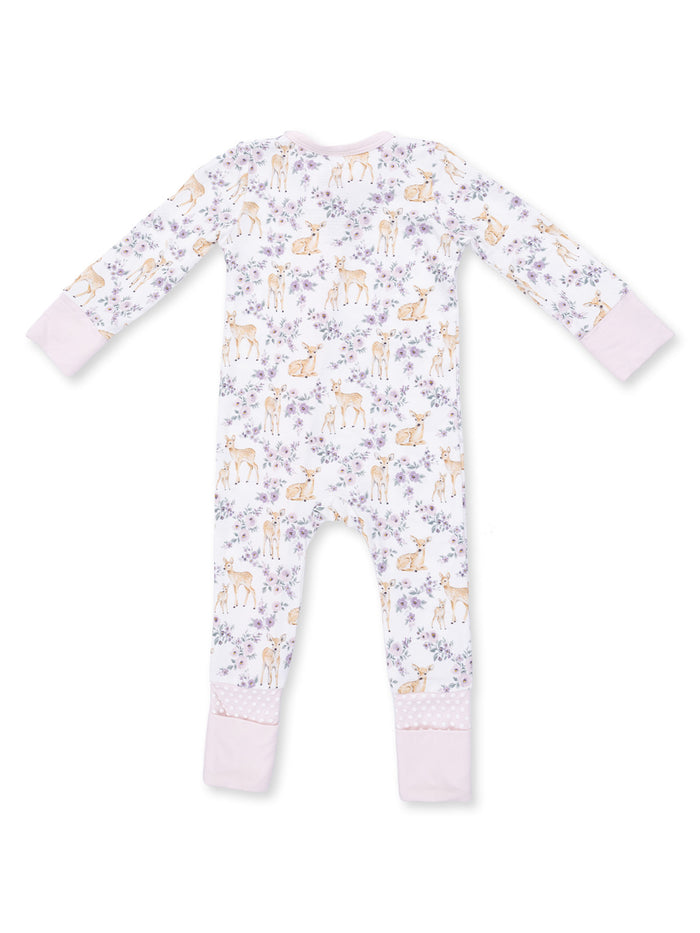 Children's pajama outfit with a floral and deer print, featuring long sleeves and soft, pink cuffs at the feet.