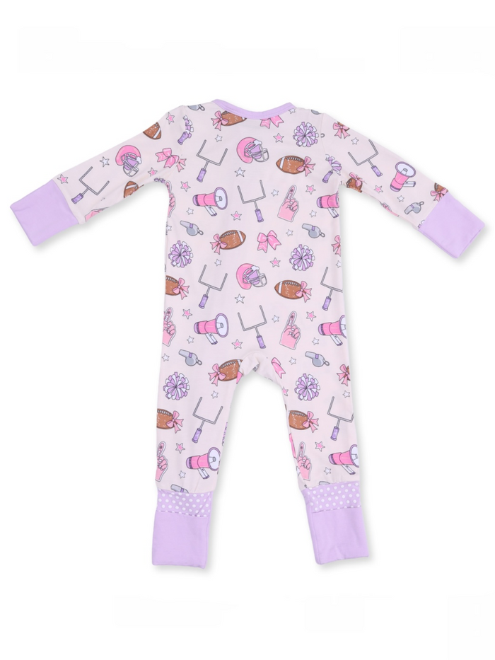 Back view of a pink pajama with sports-themed patterns and lavender cuffs, suitable for children.