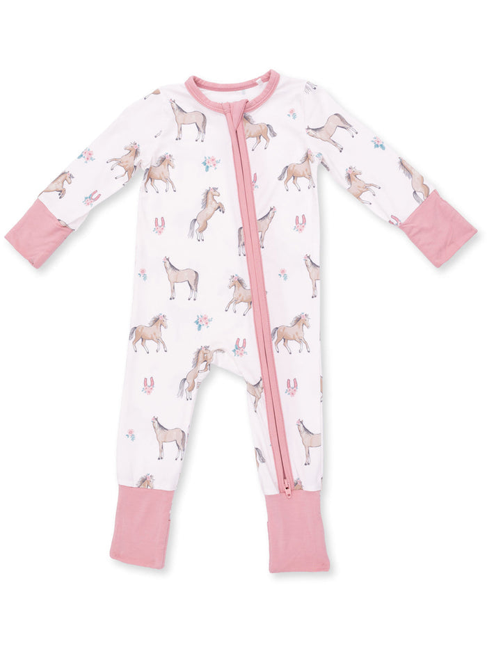 Unicorn-patterned baby pajama with pink accents and a front zipper. Ideal for comfy nighttime wear.