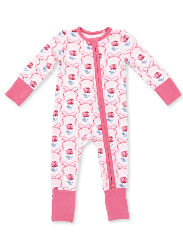 Pink floral baby onesie with long sleeves and a front zipper, featuring rose patterns and pink cuffs.