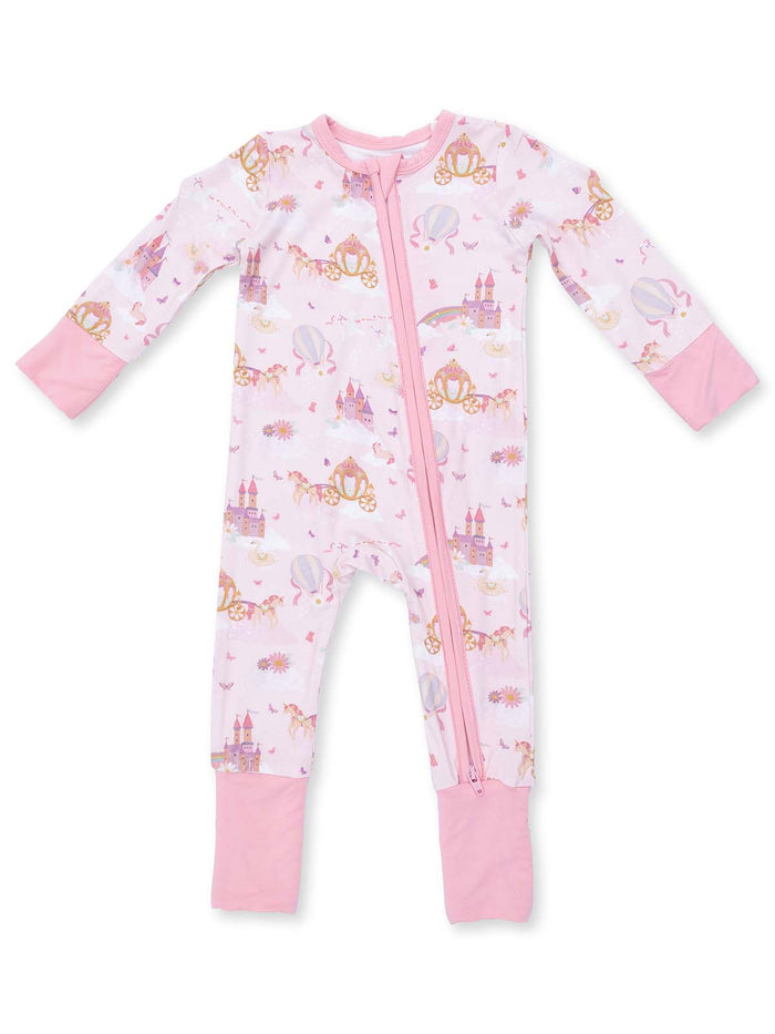 Pink infant onesie with fairy tale designs, featuring castles, unicorns, and hot air balloons.