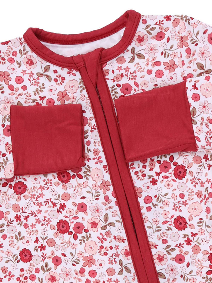 Red floral sleep sack with a zippered front and two pockets, designed for comfort and warmth.