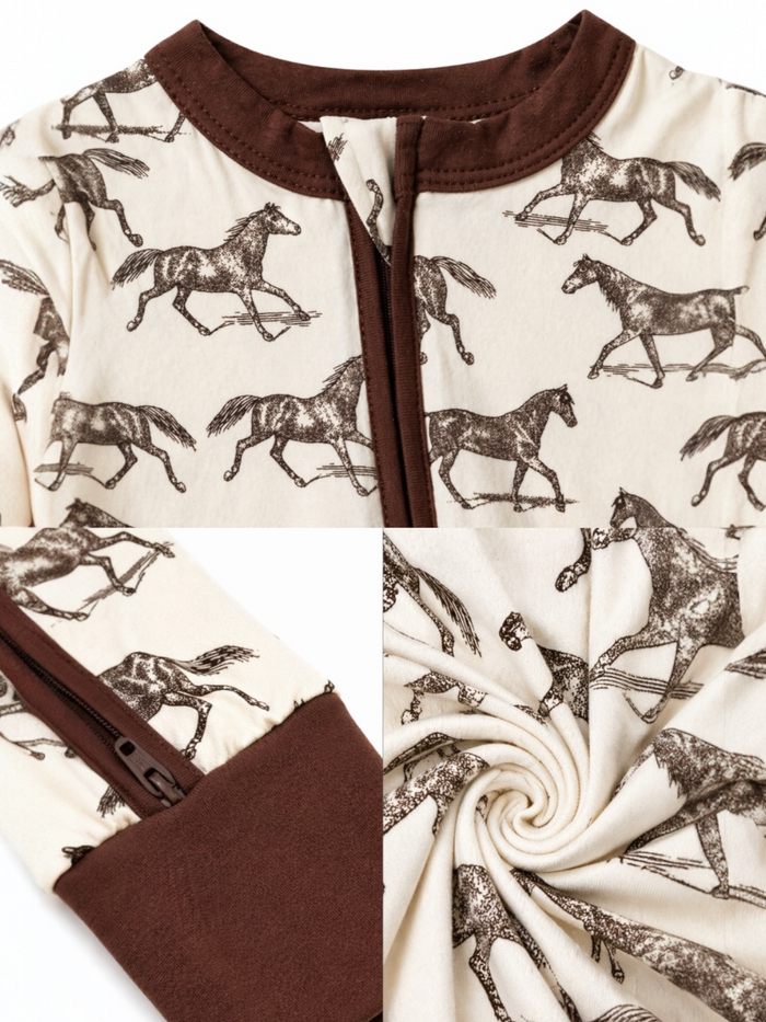 Children's zip-up onesie featuring a horse print on a cream background with brown accents.