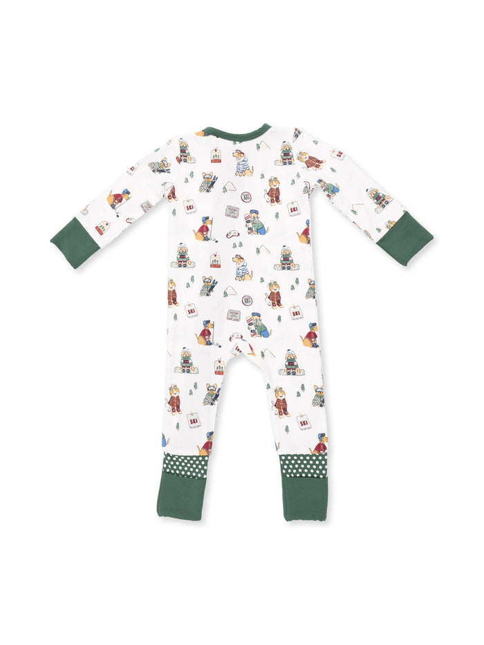 Back view of a children's pajama onesie featuring playful, colorful winter-themed illustrations.