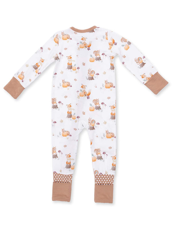 White baby onesie with woodland animal prints, pumpkins, and brown polka dot cuffs.