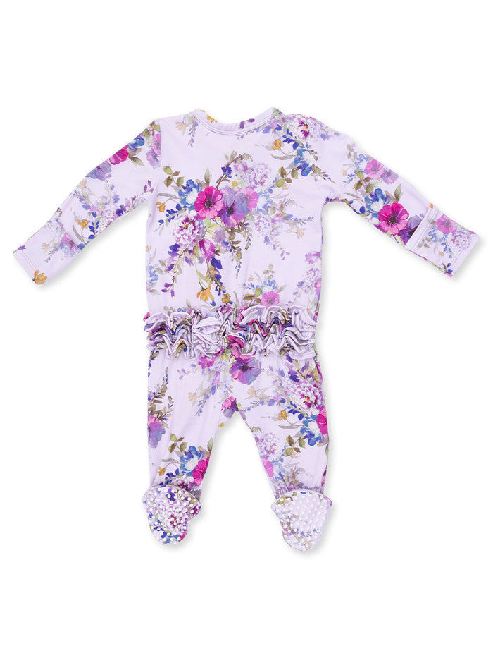 Floral printed baby onesie with ruffled back and textured feet, suitable for infant wear.