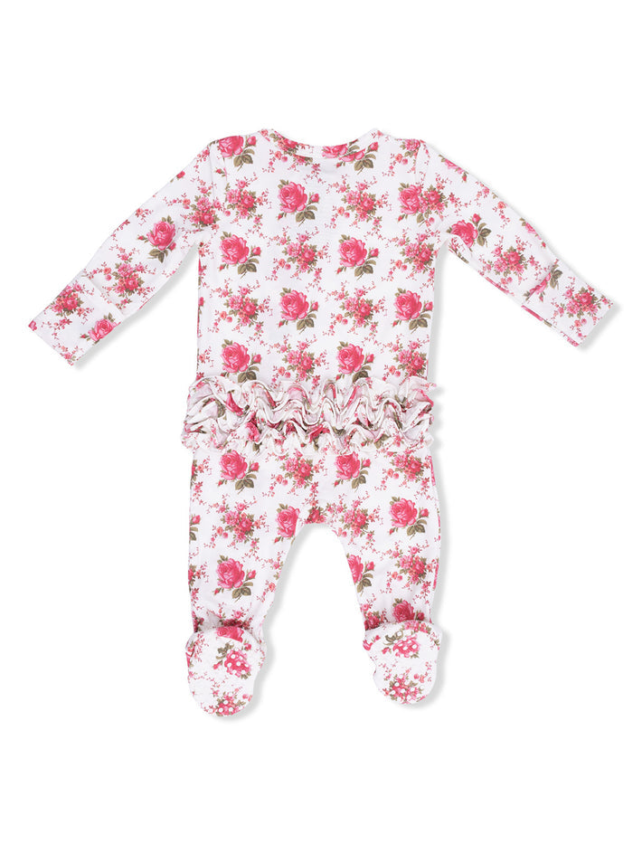 White floral infant onesie with long sleeves and ruffled back, featuring pink roses and footed design.
