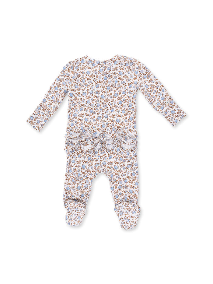 Infant romper with floral pattern and ruffled back, featuring long sleeves and footed design.