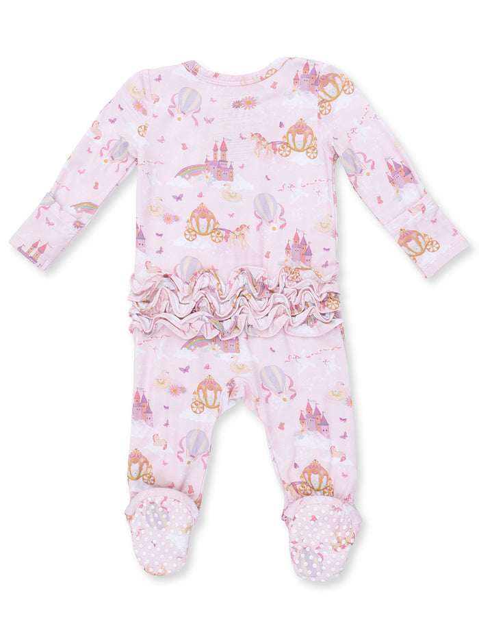 Pink children’s onesie with castle, carriage, and balloon print, featuring ruffled waist and polka dot feet.