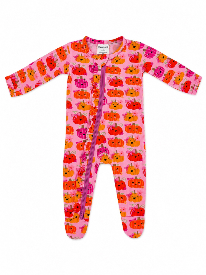Pink baby jumpsuit with colorful pumpkin pattern and a front zipper, perfect for cozy wear.