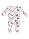 White baby onesie with colorful animal and floral patterns, featuring bears, deer, and squirrels.