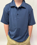 Person wearing a blue striped polo shirt and beige pants against a plain background
