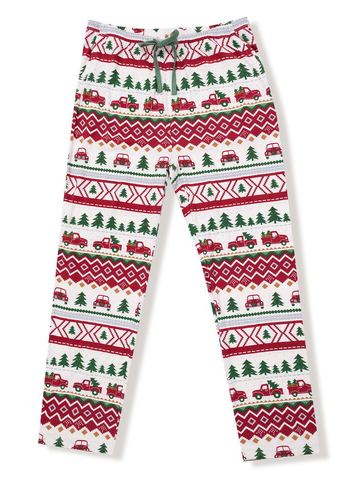 Festive pajama pants featuring red trucks, Christmas trees, and geometric patterns in red and green.