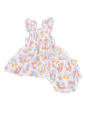 Girls' two-piece outfit featuring a smocked dress and matching bloomers with floral and fruit patterns.
