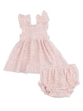 Pink floral dress with ruffled straps and matching bloomer shorts, perfect for a baby girl.