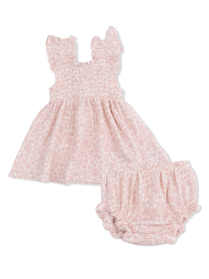 Pink floral dress with ruffled straps and matching bloomer shorts, perfect for a baby girl.