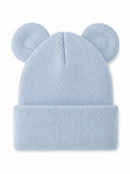 Light blue knit beanie with bear ears, featuring a rolled cuff for a cozy style.