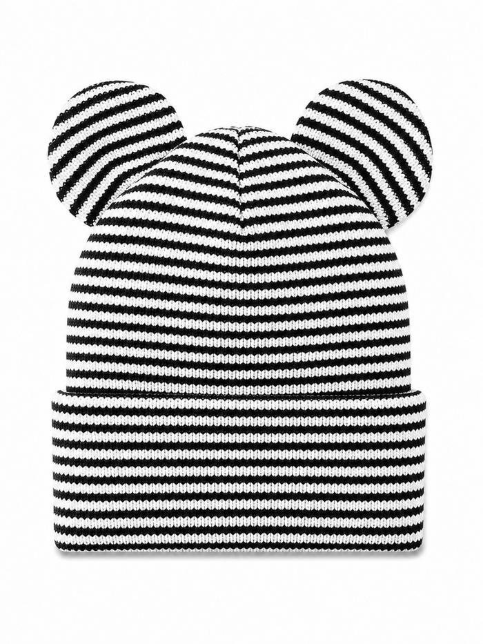 Striped black and white knit beanie with two round ears on top.