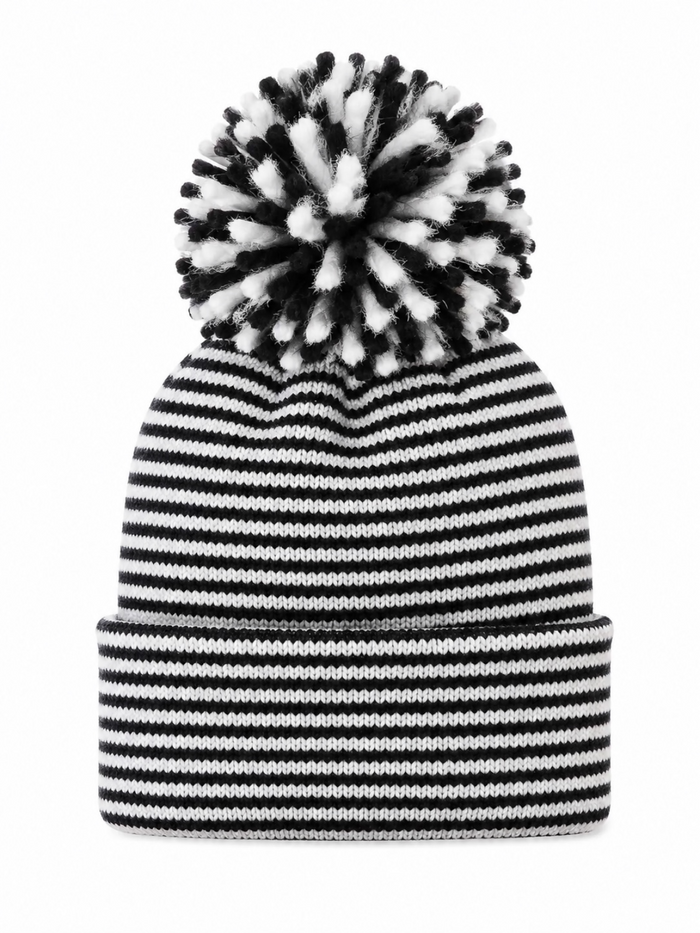Black and white striped knit beanie with a large fluffy pom-pom on top.