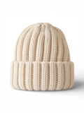 Cream-colored knitted beanie hat with a ribbed design, displayed against a white background.