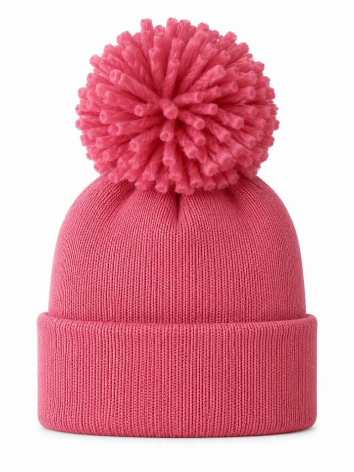 Pink knit beanie with a large pom-pom on top, perfect for winter wear or casual outings.