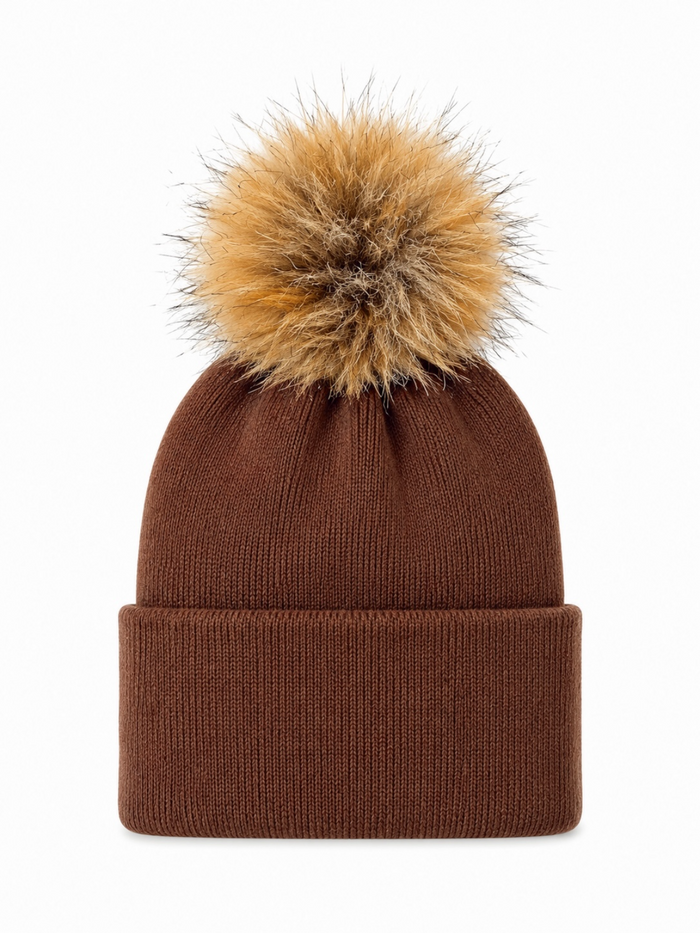 Brown knit beanie with a fluffy tan pom-pom on top, perfect for winter wear.