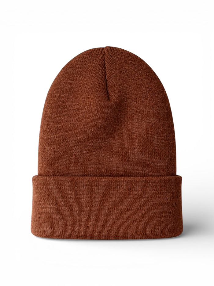 Brown knitted beanie hat with a folded cuff, displayed on a white background.