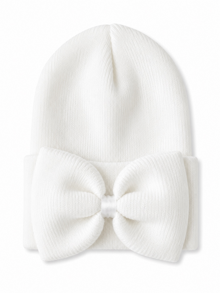 White knit beanie with a large bow on the front, perfect for cold weather.