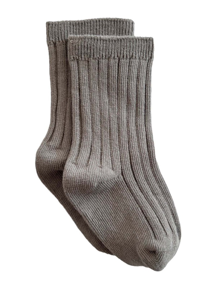 Pair of gray ribbed socks displayed on a white background.