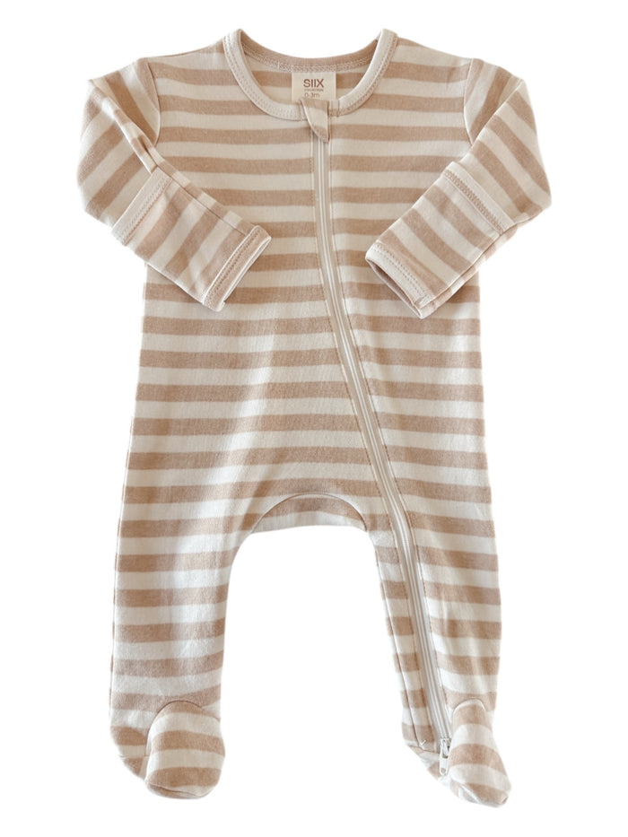 Beige and white striped baby onesie with zip closure and footed design. Ideal for comfortable infant wear.
