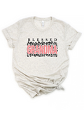 Gray t-shirt featuring "Blessed Grandma" in bold pink and black leopard print design.