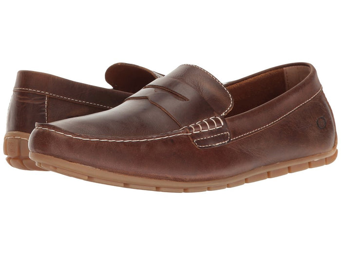 Brown leather loafer shoe on a white background