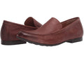Pair of brown leather loafers on a white background